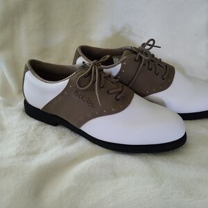 FootJoy ladies saddle style golf shoes size 8.5 in white and tan.